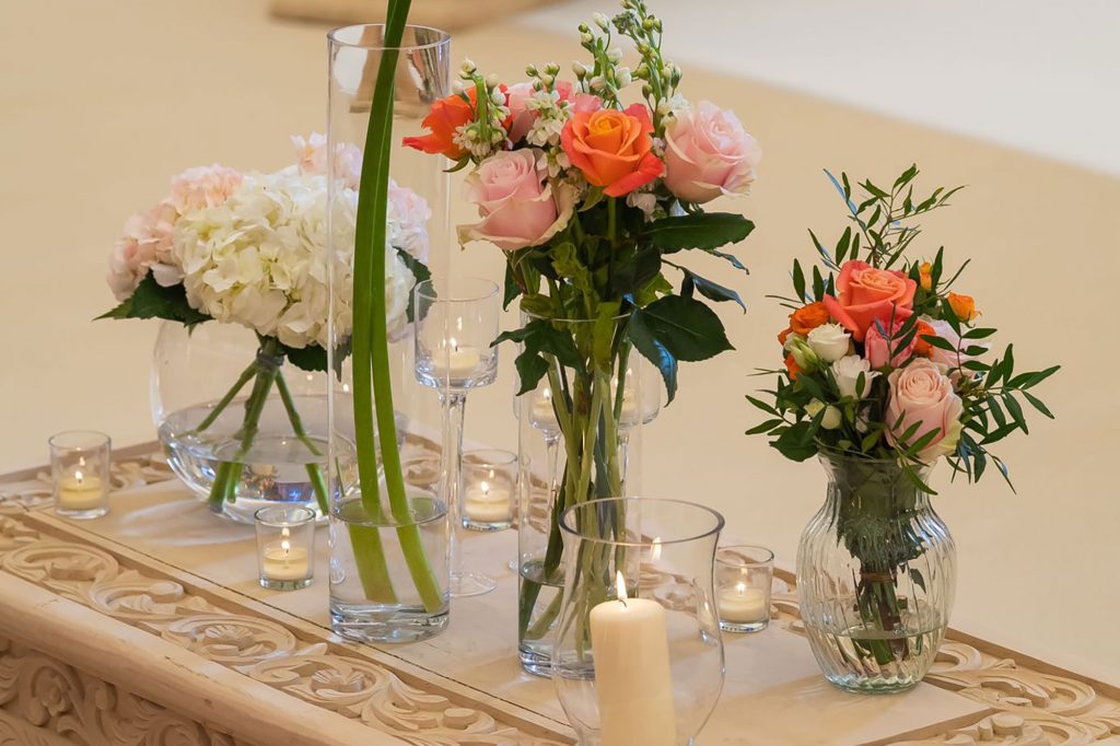 shagun-weddings-nandini-elephant-vases-flowers-table